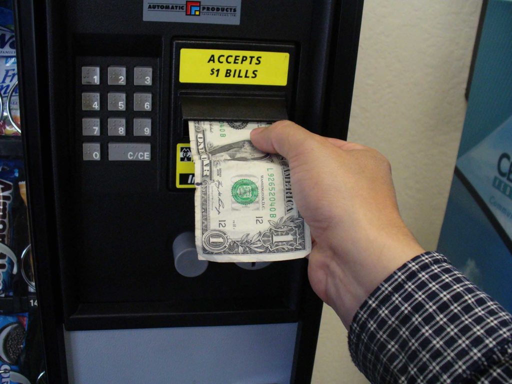 Vending machine accepts one dollar bill 