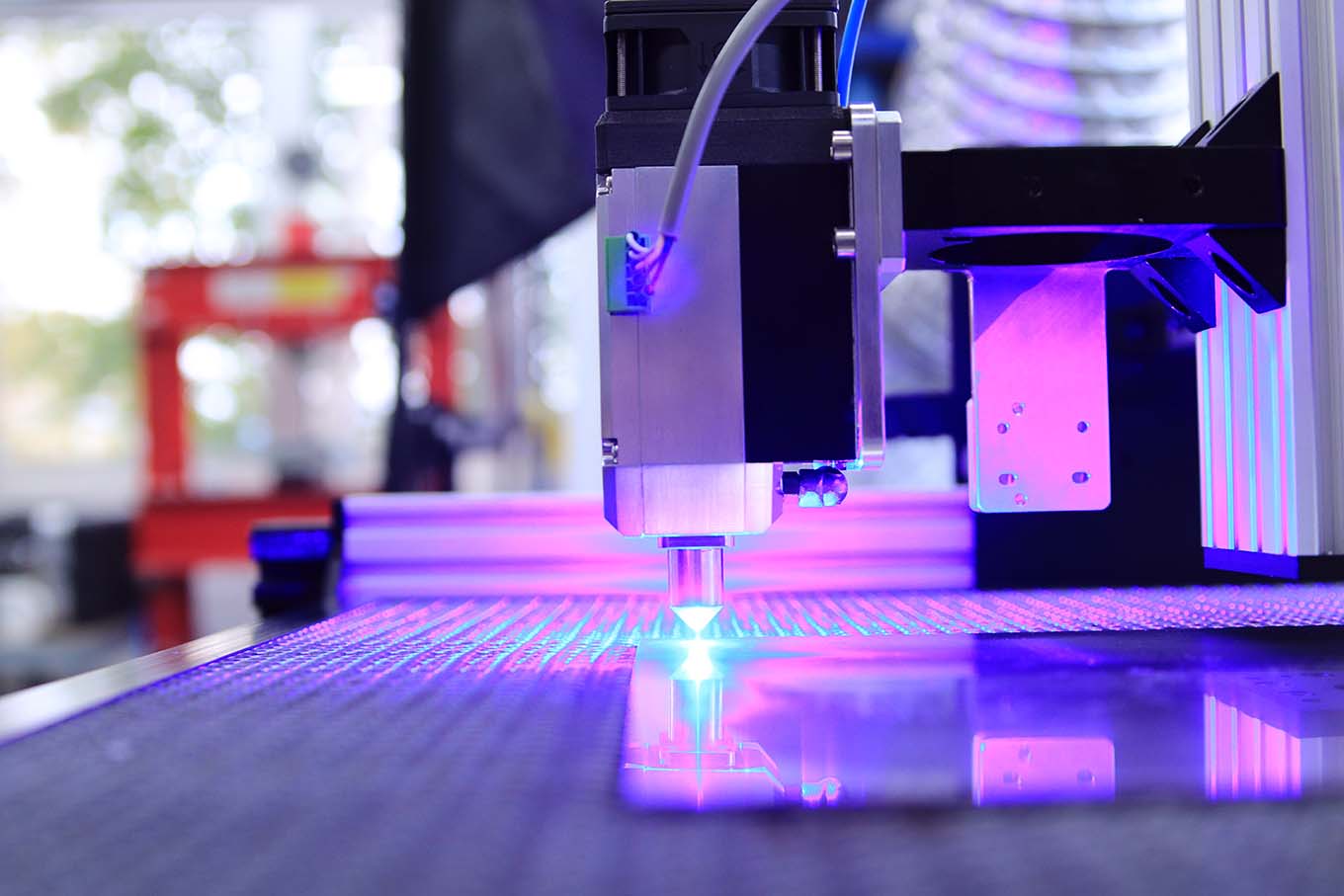 Laser engraving machine being used on metal plate