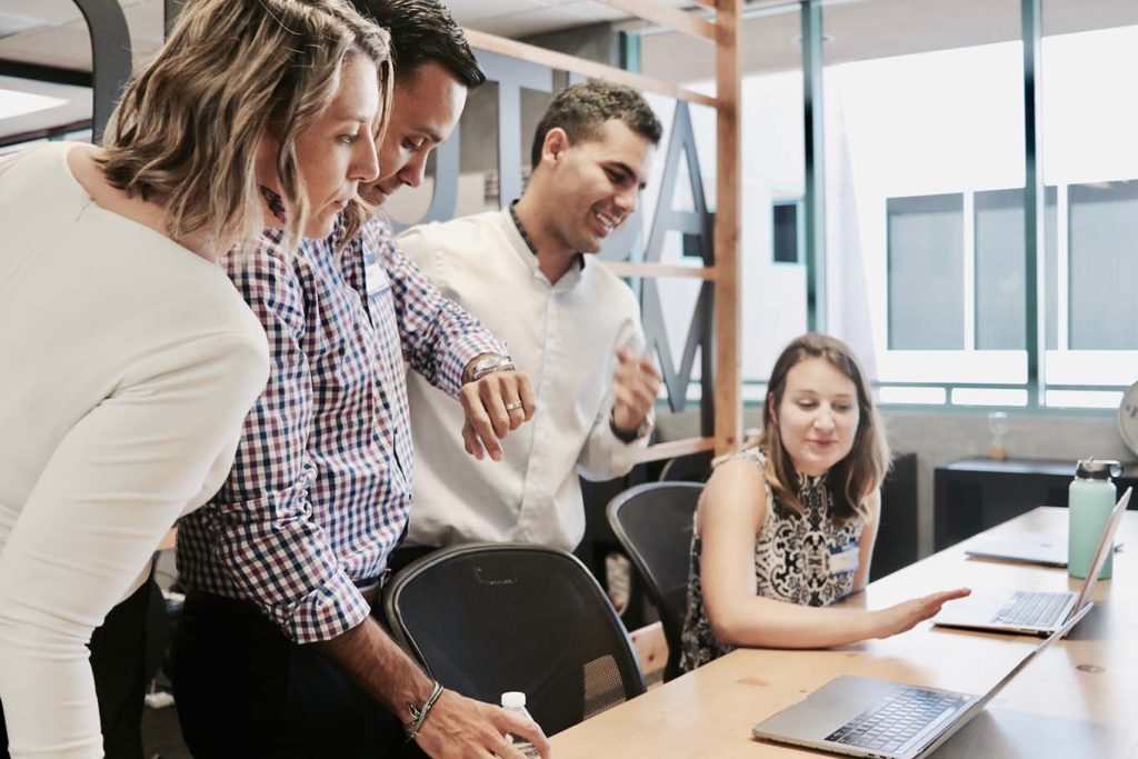 Marketing team working together in a coworking space